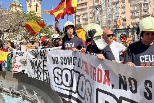epa13202204 Firefighters attend a rally of public servants to demand more 'Resources, Means, and Solutions' amid the migrant crisis outside the offices of the Delegation of the Central Government in Ceuta, Spain, 31 August 2026. Spain faced a massive migration crisis after thousands of people crossed into the North African enclave of Ceuta from Morocco in...