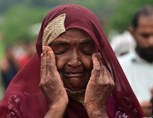 epa13202397 A relative of a victim mourns as rescue work is underway at a site after an explosion in a firecracker factory in Pipri, Uttar Pradesh state, India, 31 August 2026. The explosion in the  firecracker factory killed more than five people and several injured, according to official sources. The explosion also damaged the nearby houses.  EPA/Prabhat...