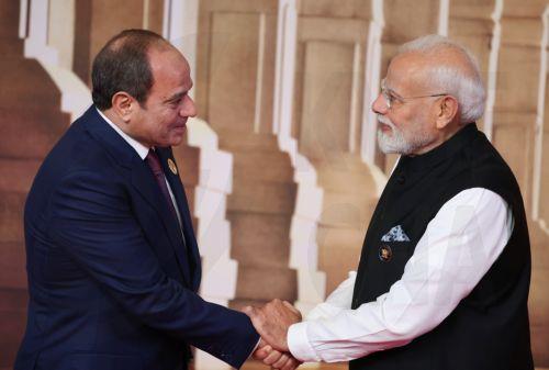 epa13233823 Egyptian President Abdel Fattah el-Sisi (L) is welcomed by Indian Prime Minister Narendra Modi during an official welcome ceremony for leaders of BRICS member states in New Delhi, India, 12 September 2026. India hosts the 18th BRICS Leaders' Summit from 12 to 13 September 2026 under the theme 'Building for Resilience, Innovation, Cooperation and...