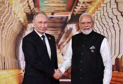 epa13233826 Russian President Vladimir Putin (L) is welcomed by Indian Prime Minister Narendra Modi during an official welcome ceremony for leaders of BRICS member states in New Delhi, India, 12 September 2026. India hosts the 18th BRICS Leaders' Summit from 12 to 13 September 2026 under the theme 'Building for Resilience, Innovation, Cooperation and...