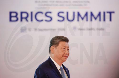 epa13233828 Chinese President Xi Jinping attends an official welcome ceremony for leaders of BRICS member states in New Delhi, India, 12 September 2026. India hosts the 18th BRICS Leaders' Summit from 12 to 13 September 2026 under the theme 'Building for Resilience, Innovation, Cooperation and Sustainability.'  EPA/ALEXANDER KAZAKOV/SPUTNIK/KREMLIN / POOL...