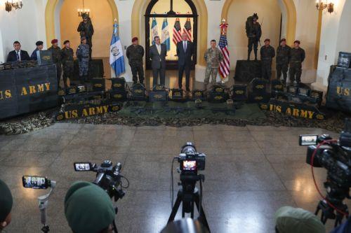 epa13254721 Guatemalan President Bernardo Arevalo de Leon (L) takes part in the reception of a shipment of weapons purchased from the United States in Guatemala City, Guatemala, 21 September 2026. The shipment is the first such delivery since a US arms embargo imposed in 1978 was lifted in March 2026, and the weapons are intended to strengthen operations...