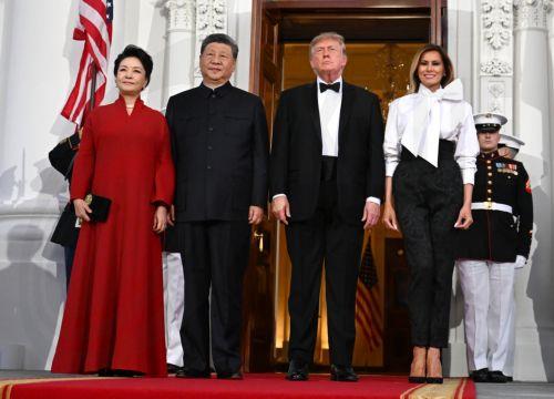 epa13261556 US President Donald J. Trump (C-R) and first lady Melania Trump (R) greet President Xi Jinping (2-L), of The People’s Republic of China, and Madame Peng Liyuan (L) on the North Portico of the White House in Washington, DC, USA, 24 September 2026.  EPA/Annabelle Gordon / POOL