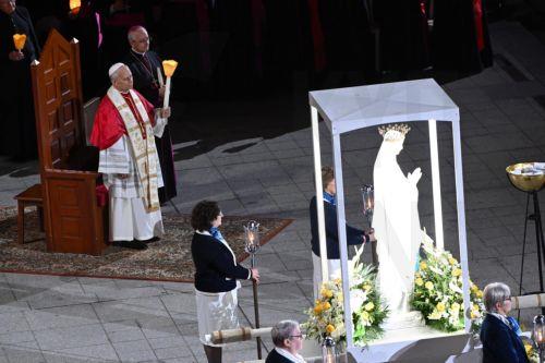 epa13267277 Pope Leo XIV (L) takes part in the prayer of the Holy Rosary and a candlelight procession at the Grotto of Massabielle, a Catholic place of pilgrimage situated beneath the Basilica of Our Lady of the Rosary, at the Sanctuary of Lourdes, France, 27 September 2026. The Pontiff's apostolic journey to France runs from 25 to 28 September under the...