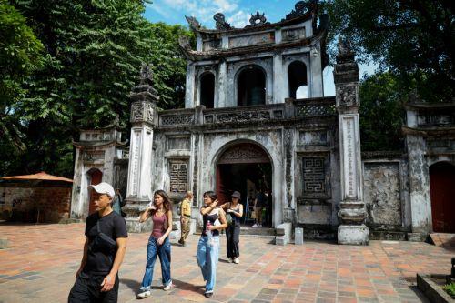 epa13269827 Tourists visit the Temple of Literature in Hanoi, Vietnam, 29 September 2026. Vietnam ranked 52nd among 110 economies in the latest World Economic Forum (WEF)’s 2026 Travel and Tourism Development Index, up seven places from 2024.  EPA/LUONG THAI LINH