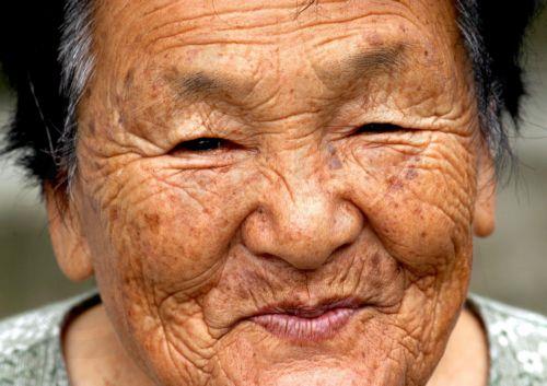 epa13273968 (FILE) -An unidentified elderly Japanese woman posing for the photographer in Kumomi, Japan 28 September 2007 (reissued on 01 October 2026). 01 October marks the United Nations International Day of Older Persons. This year, the theme is ‘The Age of Longevity: Rethinking Systems for Longer Lives.’  EPA/ANDY RAIN