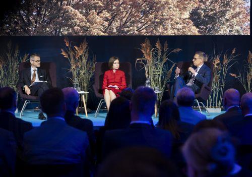 epa13277299 (L-R) Moderator David Rennie (Geopolitics Editor at The Economist), Moldova's President Maia Sandu and Finland's President Alexander Stubb attend the opening session 'Security and Stability after Russia's War in Ukraine' during the Helsinki Security Forum (HSF) 2026 in Helsinki, Finland, 02 October 2026. The fifth annual HSF takes place from 02...