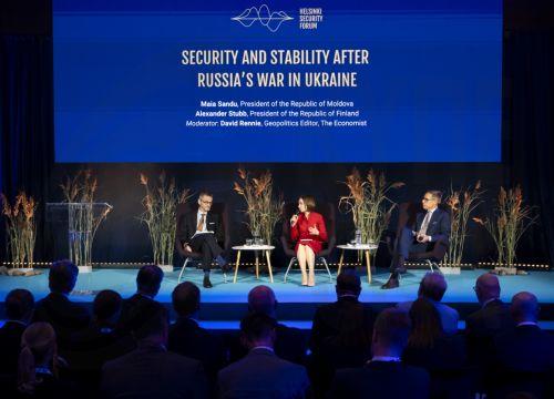 epa13277298 (L-R) Moderator David Rennie (Geopolitics Editor at The Economist), Moldova's President Maia Sandu and Finland's President Alexander Stubb attend the opening session 'Security and Stability after Russia's War in Ukraine' during the Helsinki Security Forum (HSF) 2026 in Helsinki, Finland, 02 October 2026. The fifth annual HSF takes place from 02...
