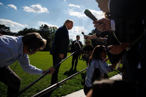 epa13283668 US President Donald Trump speaks to reporters on the South Lawn before departing the White House in Marine One in Washington, DC, USA, 05 October 2026. President Trump will deliver remarks at a midterm election rally at the Pinnacle Bank Expo Center in Grand Island, Nebraska, campaigning in support of Republican US Senator Pete Ricketts, who...