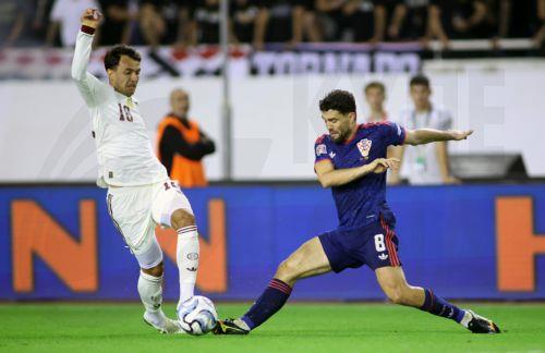 epa13285807 Spain’s Martin Zubimendi (L) and Croatia's Mateo Kovacic in action during the UEFA Nations League match Croatia against Spain, in Split, Croatia, 06 October 2026.  EPA/MAJA PRGOMET