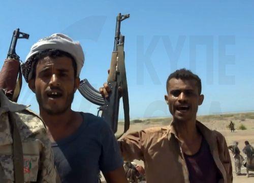 epa13286173 A handout photo made available by the Southern Giants Brigades media office shows pro-government fighters holding positions during an offensive against Houthi positions in a coastal area of Taiz province, near the Bab al-Mandeb Strait, Yemen, 06 October 2026. The Saudi-backed Yemeni government launched an offensive to retake areas under Houthi...