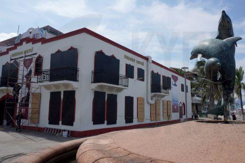 epa13293006 Naval Museum with its doors and windows protected against Hurricane Simon, which reached Category 2 status in the Mexican Pacific with sustained winds of 155 kilometers per hour, in Puerto Vallarta, Mexico, 09 October 2026.  EPA/Arturo Montero