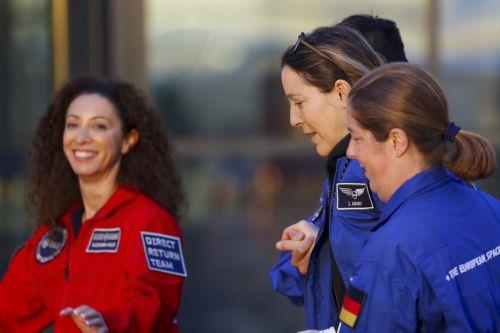 epa13293350 European Space Agency (ESA) Astronaut Sophie Adenot (C) of France disembarks from a plane as she arrives at the military part of the Cologne-Bonn airport, Germany, 10 October 2026. After 237 days in space, French astronaut Sophie Adenot of the European Space Agency (ESA) returned safely to Earth aboard a SpaceX Dragon capsule, which splashed...
