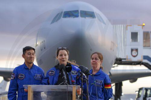 epa13293351 European Space Agency (ESA) astronaut Sophie Adenot (C) of France talks to the media upon arrival at the military section of Cologne Bonn Airport, Germany, 10 October 2026. After 237 days in space, French astronaut Sophie Adenot of the European Space Agency (ESA) returned safely to Earth aboard a SpaceX Dragon capsule, which splashed down in the...