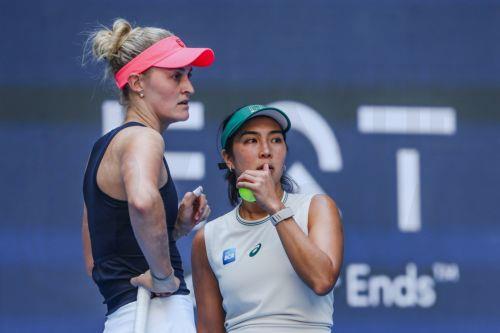 epa13293445 Erin Routliffe (R) of New Zealand and Aldila Sutjiadi (L) of Indonesia talks strategy during their Women’s Doubles match against Katerina Siniakova of the Czech Republic and Zhang Shuai of China at the China Open tennis tournament in Beijing, China, 10 October 2026. China Open runs from 28 September through 11 October.  EPA/WU HAO
