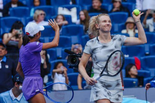 epa13293451 Katerina Siniakova (R) of the Czech Republic and Zhang Shuai (L) of China celebrate after winning their Women’s Doubles match against Erin Routliffe of New Zealand and Aldila Sutjiadi of Indonesia at the China Open tennis tournament in Beijing, China, 10 October 2026. China Open runs from 28 September through 11 October.  EPA/WU HAO