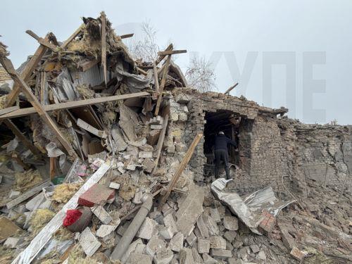 epa13293546 A man inspects the site of a Russian attack on a private building in Zaporizhzhia, Ukraine, 10 October 2026, amid the ongoing Russian invasion. At least five people, including two children, were killed and 11 others injured in overnight Russian strikes on the residential area, according to the State Emergency Service.  EPA/DARYNA NAUMOVA
