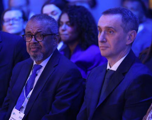 epa13296643 Tedros Adhanom Ghebreyesus (L), Director General of the World Health Organization (WHO), and Ukrainian Health Minister Viktor Liashko (R) attends the World Health Summit in Berlin, Germany, 11 October 2026. The World Health Summit, running from 11 to 13 October, is an international conference that brings together policymakers, scientists,...
