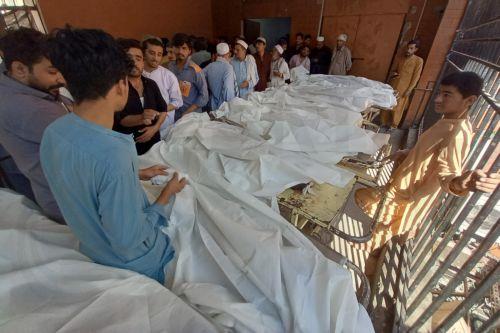 epa13306051 Parents gather beside the bodies of children killed in the collapse of a private school roof at Lady Reading Hospital in Peshawar, Khyber Pakhtunkhwa province, Pakistan, 15 October 2026. At least 17 children were killed and 20 others injured in the collapse, according to officials. Lady Reading Hospital confirmed that 17 bodies had been brought...