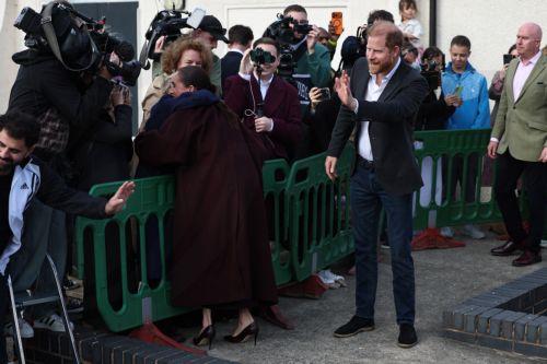 epa13306174 Harry (R) and Meghan (L), the Duke and Duchess of Sussex, depart the Community Recording Studio in Nottingham, Britain, 15 October 2026. The couple are visiting a number of charities and businesses in the East Midlands city.  EPA/NEIL HALL