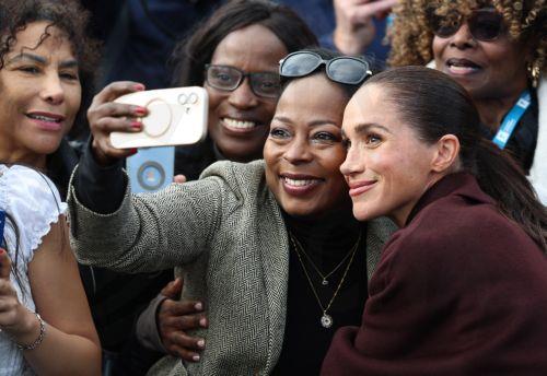 epa13306179 Meghan the Duchess of Sussex poses for a photograph as she departs the Community Recording Studio in Nottingham, Britain, 15 October 2026. The couple are visiting a number of charities and businesses in the East Midlands city.  EPA/NEIL HALL
