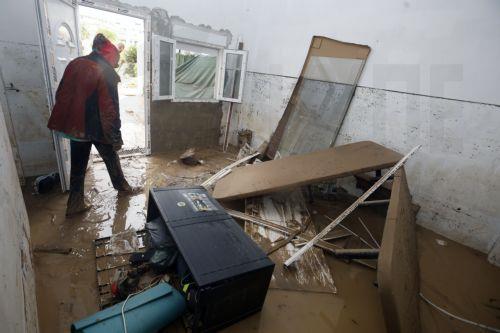 epa13315355 A view of the damage caused by the floods resulting from the passage of Storm Adam through Els Poblets, Alicante, Spain, 19 October 2026. Adam Storm has already claimed two lives and is causing 'extraordinary' rainfall and severe flooding in Valencia and Alicante, with rainfall totals exceeding 600 litres per square metre, rivers bursting their...