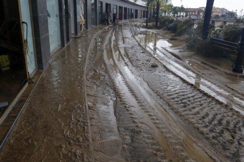 epa13315357 A view of the damage caused by the floods resulting from the passage of Storm Adam through Els Poblets, Alicante, Spain, 19 October 2026. Adam Storm has already claimed two lives and is causing 'extraordinary' rainfall and severe flooding in Valencia and Alicante, with rainfall totals exceeding 600 litres per square metre, rivers bursting their...