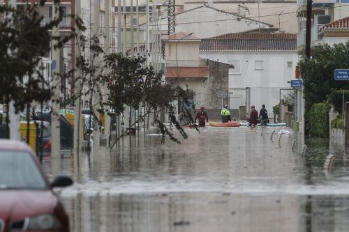 epa13315368 Emergency services provide assistance following Storm Adam’s passage through Guardamar de la Safor, Valencia, Spain,19 October 2026. Adam Storm has already claimed two lives and is causing 'extraordinary' rainfall and severe flooding in Valencia and Alicante, with rainfall totals exceeding 600 litres per square metre, rivers bursting their banks...