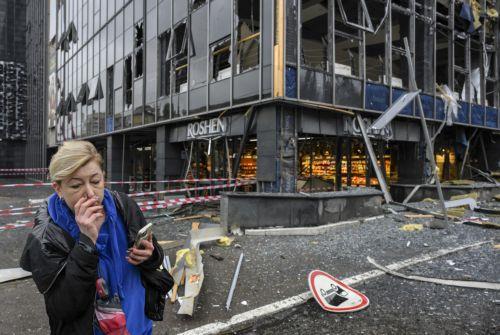 epa13315399 A woman walks past the site of a Russian missile strike on a shopping mall in Kyiv, Ukraine, 19 October 2026, amid the ongoing Russian invasion. At least one person was killed, and 10 others were injured in strikes across the region, including three children, according to the State Emergency Service.  EPA/MAXYM MARUSENKO