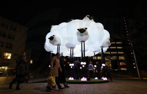 epa13323693 'Dream Herd’ by Australian design studio Amigo & Amigo on display during 'River of Light,' an illuminated outdoor art trail in Liverpool, Britain, 22 October 2026. The exhibition trail features 13 large-scale light installations based on the theme ’Together', with installations focusing on how light can bring people closer together. The...