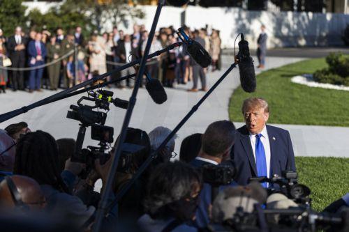 epa13324014 US President Donald Trump (R) speaks to reporters as he departs the White House for a campaign rally in Iowa, in Washington, DC, USA, 22 October 2026. Trump discussed Starlink's operations in Ukraine as well as a campaign ad from Ohio Republican gubernatorial candidate Vivek Ramaswamy that features Democratic opponent Amy Acton’s estranged...