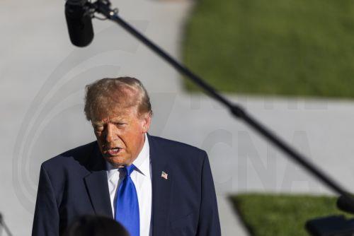 epa13324016 US President Donald Trump speaks to reporters as he departs the White House for a campaign rally in Iowa, in Washington, DC, USA, 22 October 2026. Trump discussed Starlink's operations in Ukraine as well as a campaign ad from Ohio Republican gubernatorial candidate Vivek Ramaswamy that features Democratic opponent Amy Acton’s estranged mother. ...