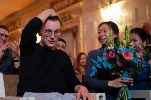 epa13324228 Ukrainian violinist Bohdan Luts (L) reacts after winning the final of the 17th International Henryk Wieniawski Violin Competition at the Adam Mickiewicz University in Poznan, Poland, 22 October 2026.  EPA/Marek Zakrzewski POLAND OUT
