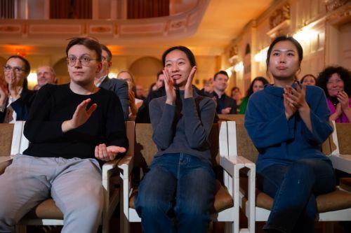 epa13324230 (L-R) Winner Ukrainian violinist Bohdan Luts, second-placed Chinese violinist Jinzhu Li and third-placed South Korean violinist SooBeen Lee react after the final of the 17th International Henryk Wieniawski Violin Competition at the Adam Mickiewicz University in Poznan, Poland, 22 October 2026.  EPA/Marek Zakrzewski POLAND OUT