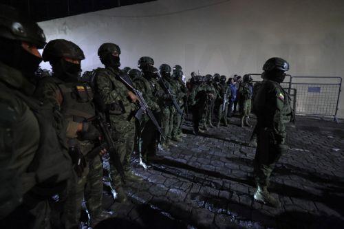 epa13324473 Members of the Ecuadorian Police guard outside El Inca Prison in Quito, Ecuador, 22 October 2026. At least eight inmates were killed and 10 people were injured in separate attacks at two of Ecuador's main prisons, breaking a long period without killings in Ecuadorian prisons following prison interventions carried out by the government of...