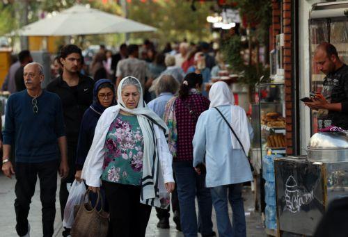 epa13336130 Iranians walk on a street in Tehran, Iran, 28 October 2026, amid the ongoing US-Iran conflict.  EPA/ABEDIN TAHERKENAREH RESTRICTIONS: NO Access Israel Media/Persian Language TV Stations Outside Iran/Strictly No Access BBC Persian/VOA Persian/Manoto TV/Iran International TV. (As mandated by Iran's Directorate General for Foreign Media) --