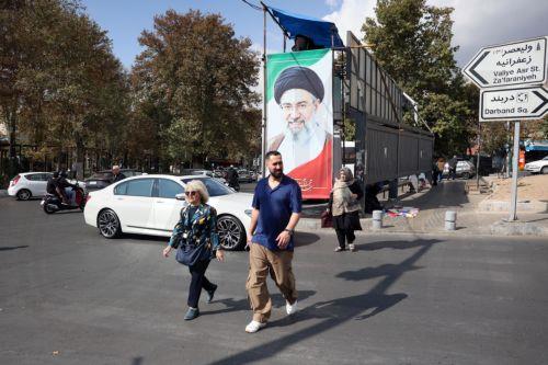 epa13336132 Iranians walk past billboards featuring Iran’s Supreme Leader Ayatollah Mojtaba Khamenei on a street in Tehran, Iran, 28 October 2026, amid the ongoing US-Iran conflict.  EPA/ABEDIN TAHERKENAREH RESTRICTIONS: NO Access Israel Media/Persian Language TV Stations Outside Iran/Strictly No Access BBC Persian/VOA Persian/Manoto TV/Iran International...
