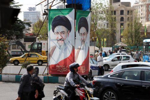 epa13336133 Iranians drive past billboards featuring Iran’s Supreme Leader Ayatollah Mojtaba Khamenei on a street in Tehran, Iran, 28 October 2026, amid the ongoing US-Iran conflict.  EPA/ABEDIN TAHERKENAREH RESTRICTIONS: NO Access Israel Media/Persian Language TV Stations Outside Iran/Strictly No Access BBC Persian/VOA Persian/Manoto TV/Iran International...