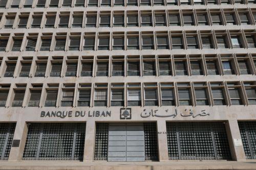 epa13336275 The Lebanese Central Bank building in Beirut, Lebanon, 28 October 2026. Bank customers gather outside the building to protest the financial regularization plan and denounce the continued restrictions on withdrawals and transfers imposed by local banks since 2019.  EPA/WAEL HAMZEH