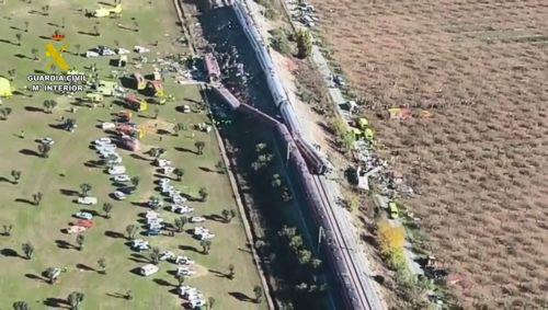 epa13336305 A handout photo made available by the Guardia Civil shows an aerial view in a frame of a video taken with a drone of the scene of the two high-speed trains (AVE in Spanish symbols), one of Renfe and another of Iryo, that have crashed in the village of Urda, Toledo, Spain, 28 October 2026. At least ten people have been killed, Spanish media...