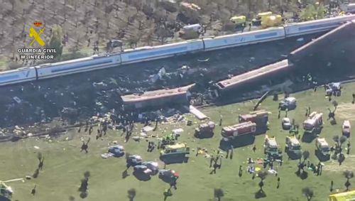 epa13336337 A handout photo made available by the Guardia Civil shows an aerial view in a frame of a video taken with a drone of the scene of the two high-speed trains (AVE in Spanish symbols), one of Renfe and another of Iryo, that have crashed in the village of Urda, Toledo, Spain, 28 October 2026. At least ten people have been killed, Spanish media...