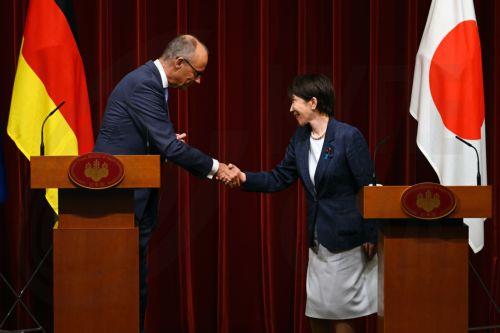 epa13336340 German Chancellor Friedrich Merz (L) and Japanese Prime Minister Sanae Takaichi (R) shake hands during a joint press conference at the prime minister's official residence in Tokyo, Japan, 28 October 2026. German Chancellor Merz, accompanied by a business delegation, is currently on a trip to Singapore, Japan and South Korea until 30 October. ...