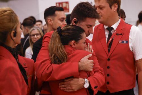 epa13338993 Workers of the Iryo high-speed rail company hug each other after they observed five-minute silence in memory of victims of the Urda train crash at Sants railway station in Barcelona, northeastern Spain, 29 October 2026. The death toll of the Urda train crash has risen to 69, reported Castilla-La Mancha's regional president, Emiliano Garcia Page....