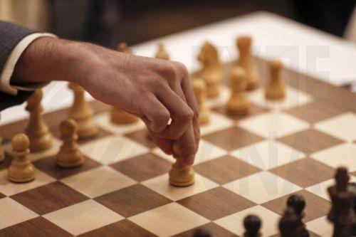 epa10325317 A member of the Indian chess team competes during the World Team Chess Championship semifinals in Jerusalem, 24 November 2022. The Israel Chess Federation hosts the World Team Championship between 20-25 November.  EPA/ATEF SAFADI