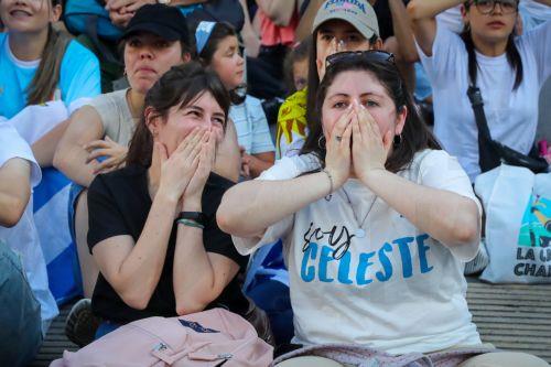 epa10335542 Fans react as they watch the match between Uruguay and Portugal of the Qatar 2022 World Cup, in Montevideo, Uruguay, 28 November 2022.  EPA/Raul Martinez