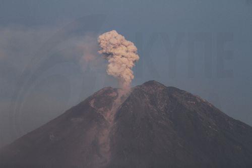 epa10349049 Mount Semeru spews volcanic materials as seen from Lumajang, East Java, Indonesia, 05 December 2022. Authorities have raised the Mount Semeru alert status to the highest level following its eruption early on 04 December 2022 forcing around two thousands villagers to flee their home. The 3,376-metre Semeru is one of the most active volcanoes on...