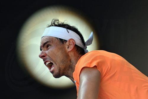 epa10408349 Rafael Nadal of Spain in action during his Menâ€™s Singles 1st round match against Jack Draper of Great Britain on Day 1 of the 2023 Australian Open tennis tournament at Melbourne Park in Melbourne, Australia, 16 January 2023.  EPA/LUKAS COCH AUSTRALIA AND NEW ZEALAND OUT