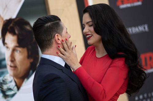 epa10546493 Andre Lemmers and Adriana Lima (R) interact as they attend the premiere of 'Air' at the Regency Village Theatre in Los Angeles, California, USA, 27 March 2023. The movie will be released in theaters on 05 April 2023.  EPA/ETIENNE LAURENT
