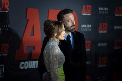 epa10546614 US actress and singer Jennifer Lopez and actor Ben Affleck (R) attend the premiere of 'Air' at the Regency Village Theatre in Los Angeles, California, USA, 27 March 2023. The movie will be released in theaters on 05 April 2023.  EPA/ETIENNE LAURENT