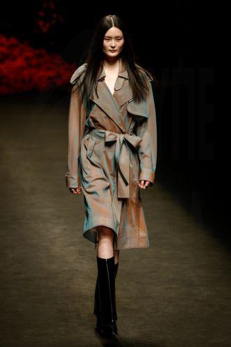 epa10546748 A model presents a creation by 'Zickness by Zic' during the China Fashion Week A/W 2023 in Beijing, China, 28 March 2023. The 2023 China Fashion Week runs from 24 to 31 March 2023.  EPA/MARK R. CRISTINO